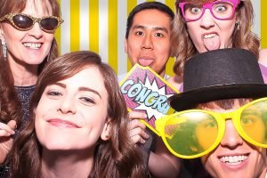 wedding guests enjoying photo booth hire